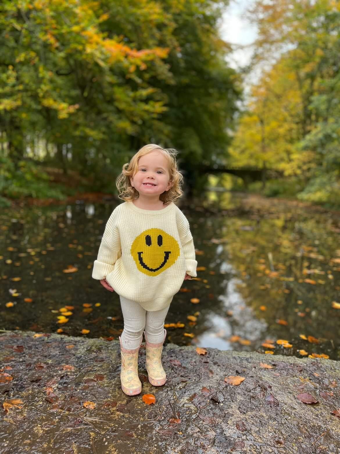 Yellow smiley face jumper sale